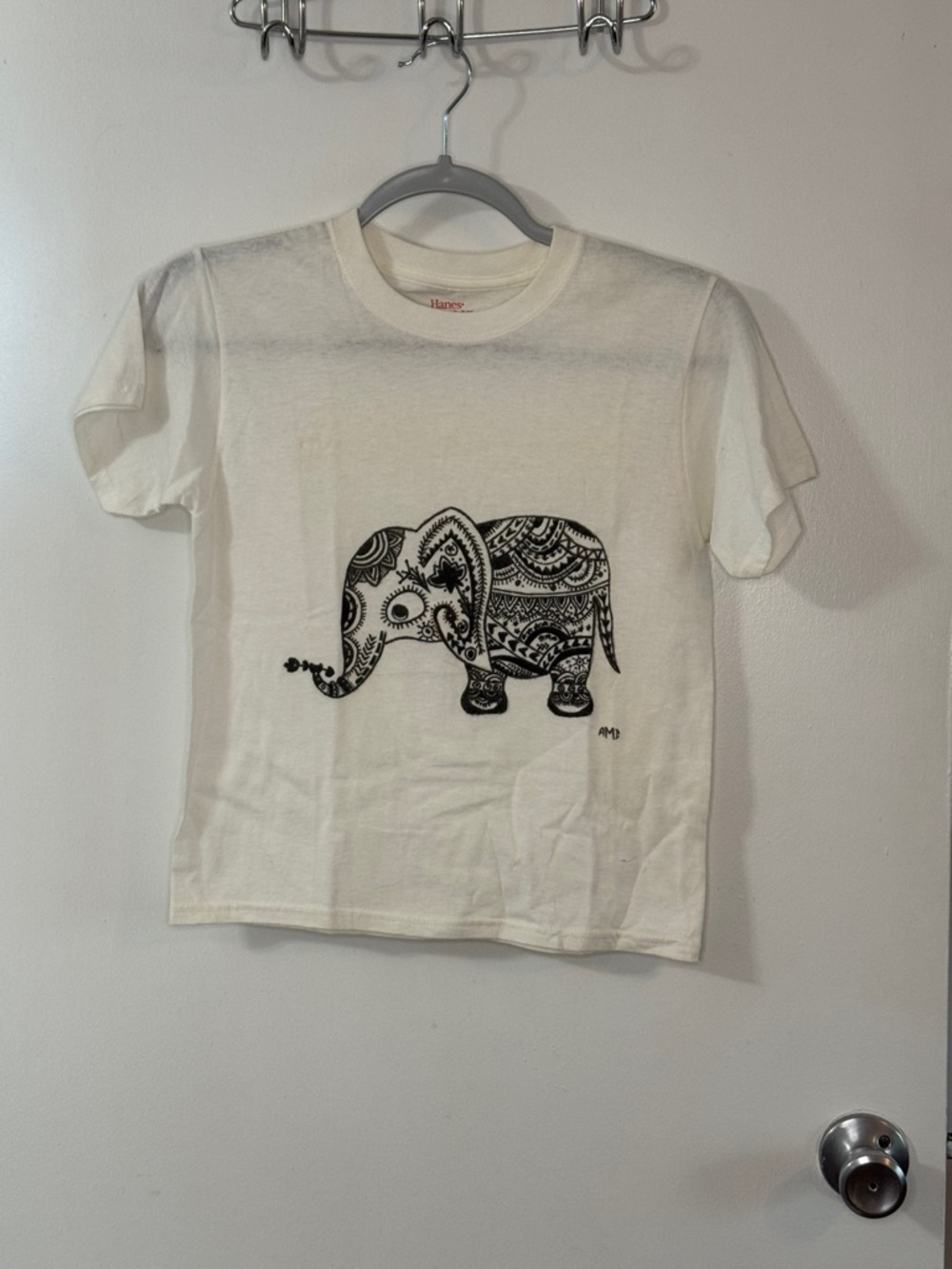 Hand Crafted Cream Tee with Black Decorative Elephant